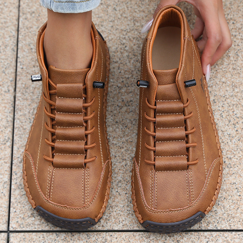 Sneakers Mona a punta larga marroni cognac, lacci e suola in gomma scura