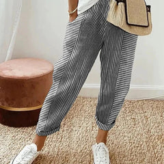 Lightweight striped trousers in blue with cuffed ankle hem