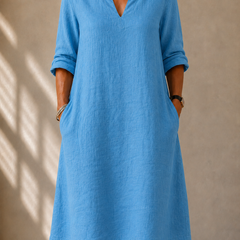Blue V-neck midi dress with three-quarter sleeves, relaxed fit