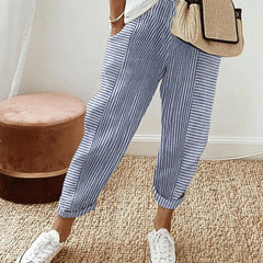 Lightweight blue pinstripe trousers with relaxed fit and cuffed ankle hem