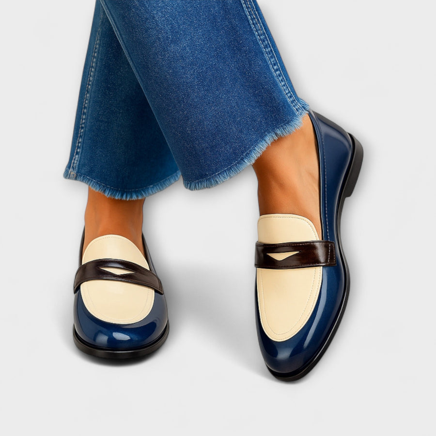 Navy and cream loafers with black trim, glossy patent finish, slip-on slip style
