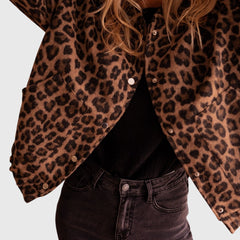 Leopard print jacket with button front and two chest pockets, long sleeves