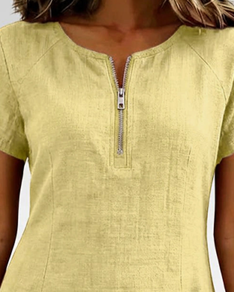 Abito in cotone verde chiaro con zip frontale a punto metallico