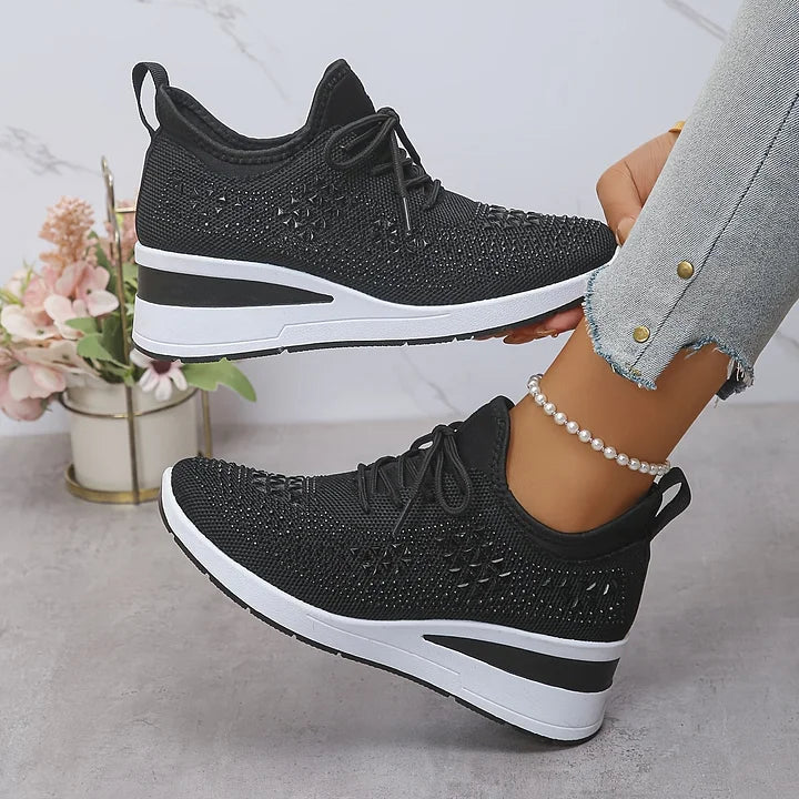 Black orthopaedic trainers, lace-up knit with textured pattern and white platform sole