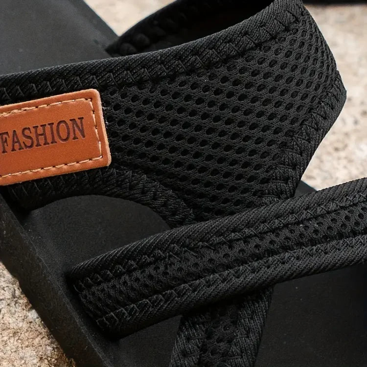Sandali ortopedici neri dettaglio tessuto traforato e cinturino con etichetta FASHION