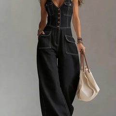 Black denim relaxed wide-leg overall with button-front, V-neck, and patch pockets