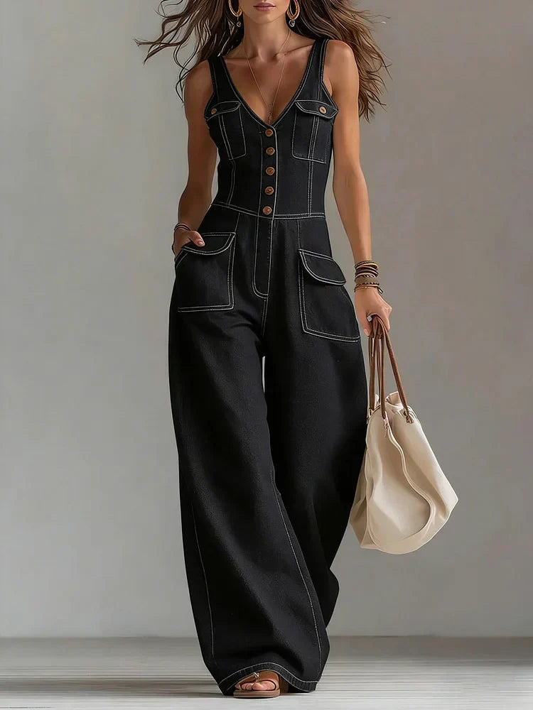 Black denim relaxed wide-leg overall with button-front, V-neck, and patch pockets