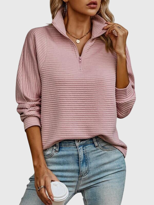 Women’s pink ribbed knit half-zip jumper, mock placket detail, long sleeves.