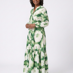 Green-and-white tie-waist tiered maxi dress with long sleeves and floral print