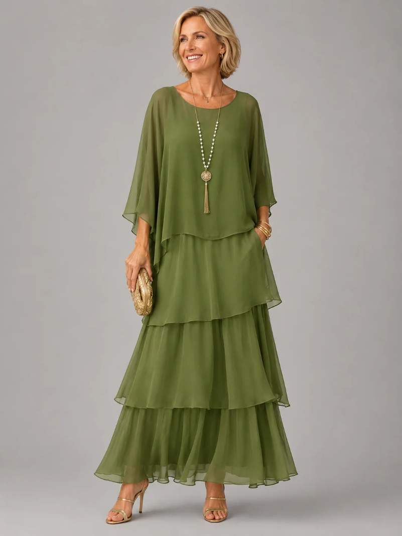 Green tiered maxi dress with loose dolman sleeves and scoop neckline, flowing layered tiers