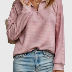 Women’s pink ribbed knit quarter-zip jumper with long sleeves and pullover fit.