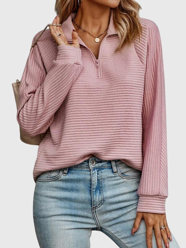 Women’s pink ribbed knit quarter-zip jumper with long sleeves and pullover fit.
