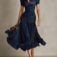 Dark blue striped satin midi dress with V-neck, ruched waist, short sleeves, full pleated skirt.