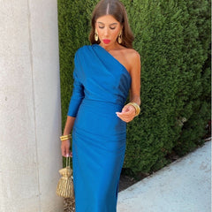Royal blue one-shoulder draped midi dress with side ruching and fitted silhouette