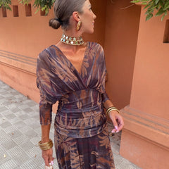 Leaf-print wrap maxi dress in dark tones with V-neck and ruched waist detail