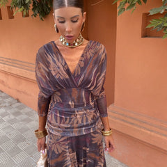 Leaf-print wrap maxi dress with long sleeves, V-neck, and draped ruched waist