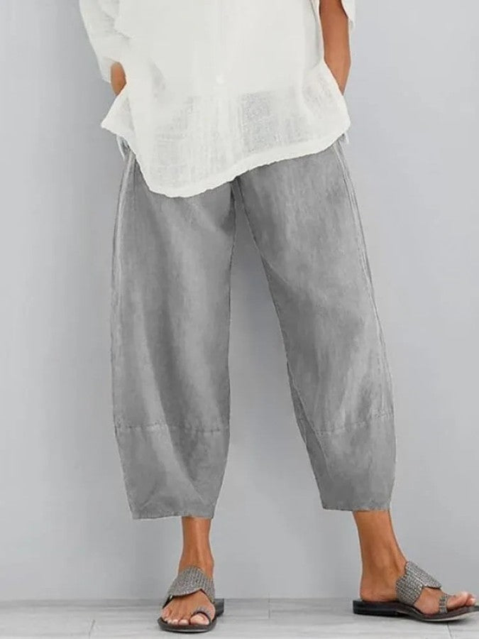 Grey casual cropped trousers, loose fit with ankle-length cuffed hem