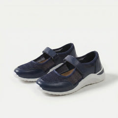 Scarpe comfort blu scuro con fascia a strappo e tomaia traforata, suola spessa bianca-grigia.