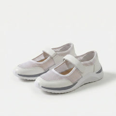 Scarpe comfort bianche con fascia a strappo e tomaia traforata, suola spessa grigia.
