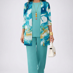 Three-piece trouser set with turquoise pants and blue patterned jacket
