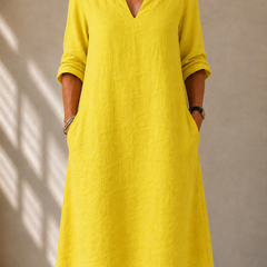 Yellow relaxed V-neck midi dress with 3/4 sleeves and side pockets