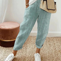Classic striped trousers, green with white vertical stripes and cuffed hems