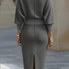 Abito midi elegante grigio, zip posteriore, maniche a tre quarti, taglio longuette