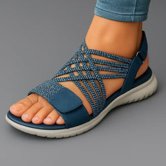 Sandali ortopedici ergonomici blu con cinturino intrecciato e suola bianca ammortizzata