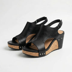 Sandali neri ortopedici con zeppa sughero, fasce aperte e borchie laterali