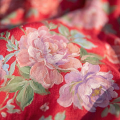 Red floral print fabric close-up