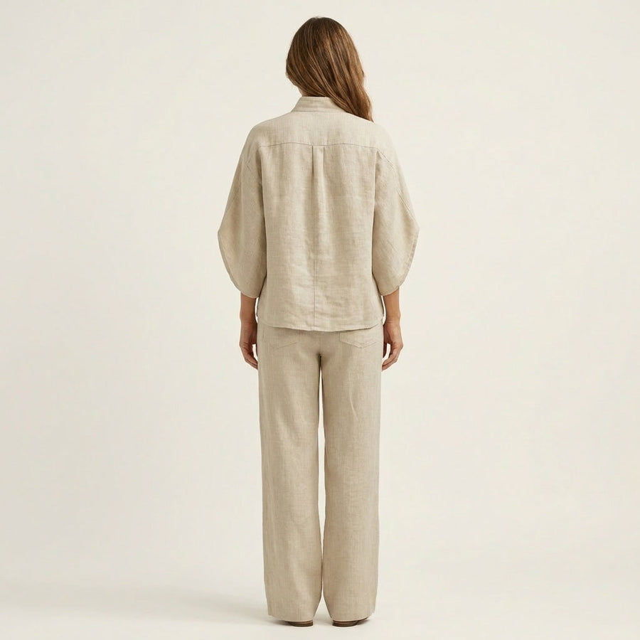 Sand linen two-piece set, back view: relaxed top and wide-leg trousers