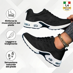 Scarpe ergonomiche nere con lacci e suola ammortizzata bianca con inserti ovali