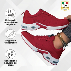 Scarpe ergonomiche rosse con lacci e suola ammortizzata bianca con inserti ovali