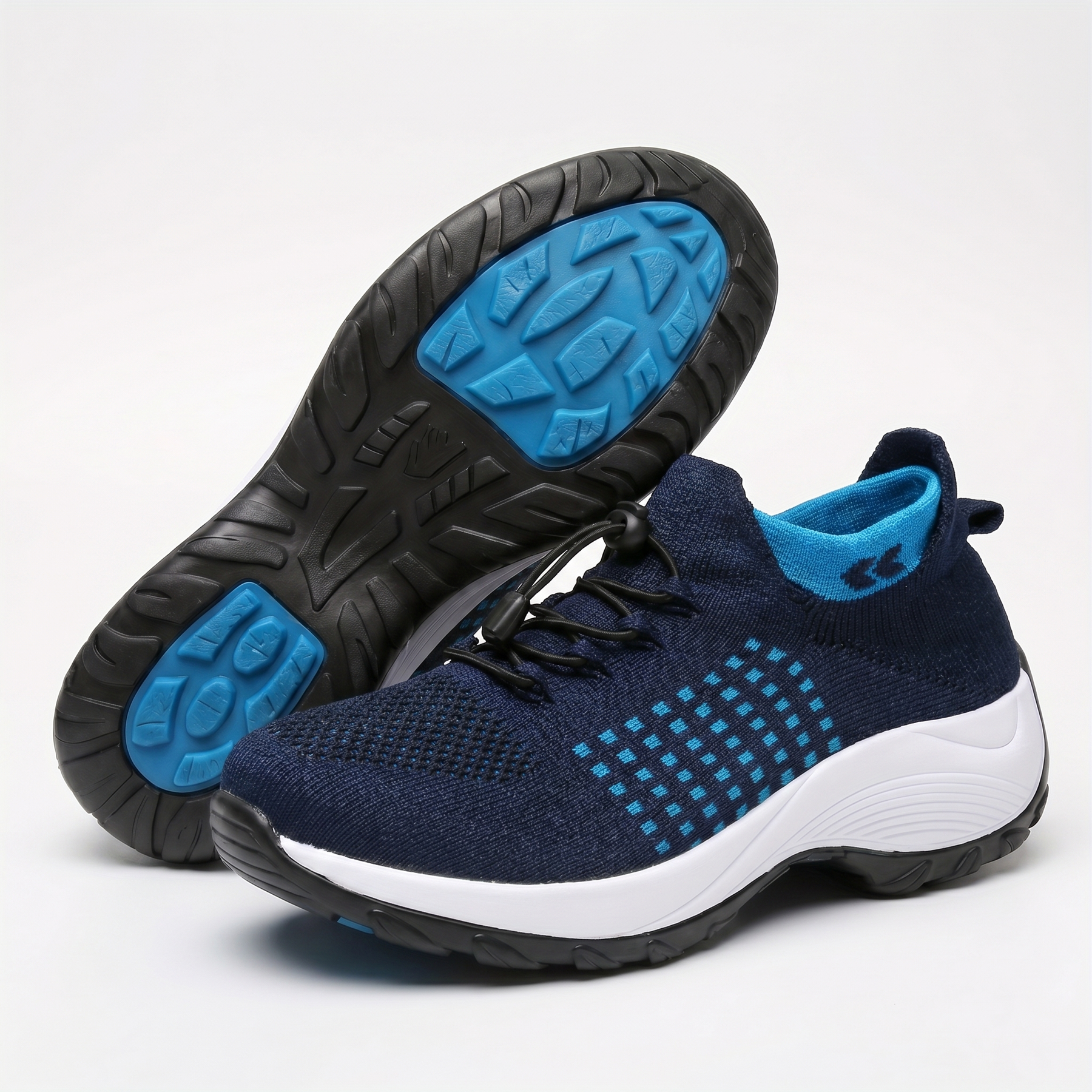 Scarpa comfort ortopedica blu con inserti azzurri e suola bianca.