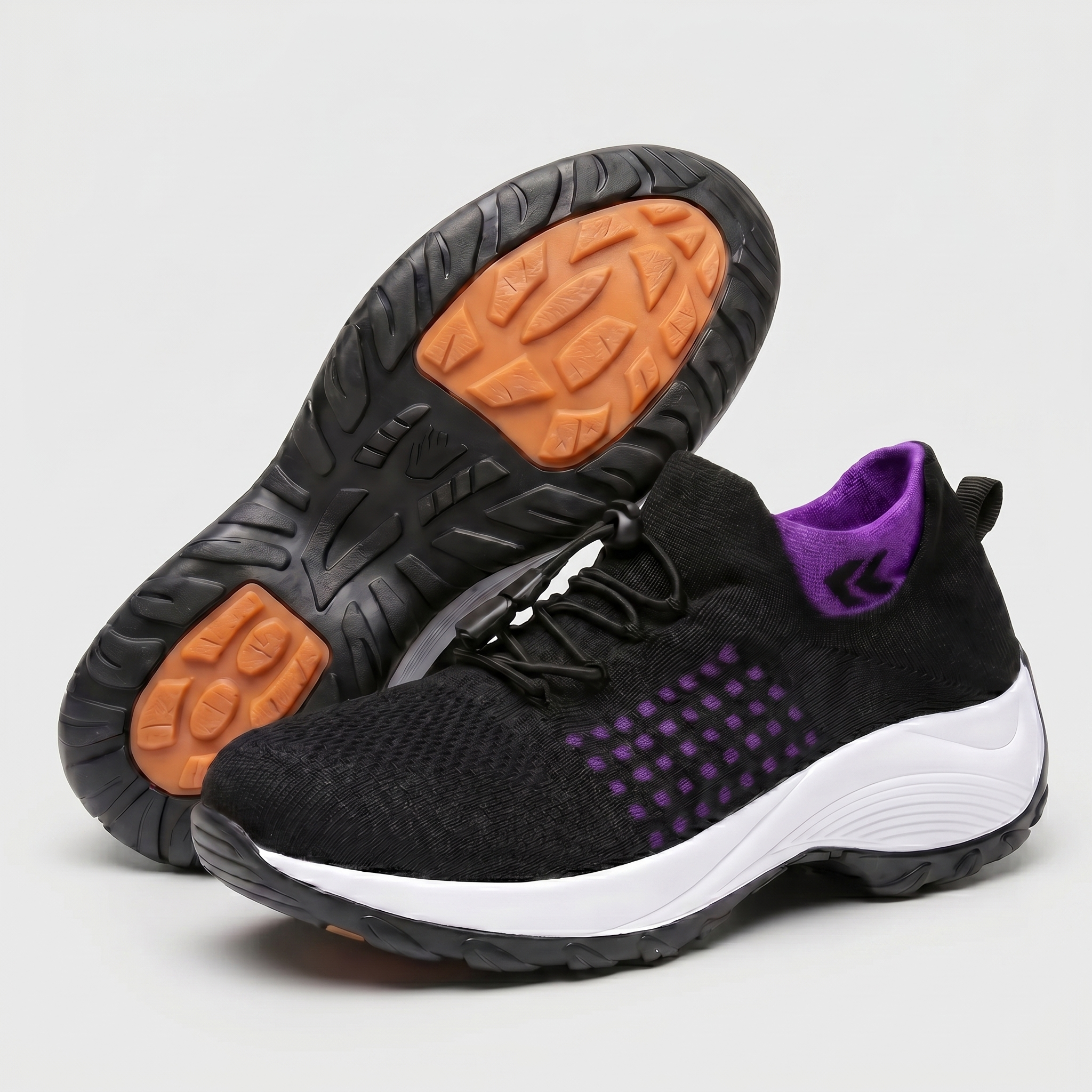 Scarpe comfort ortopediche nere con motivo a griglia viola e suola con inserti arancioni