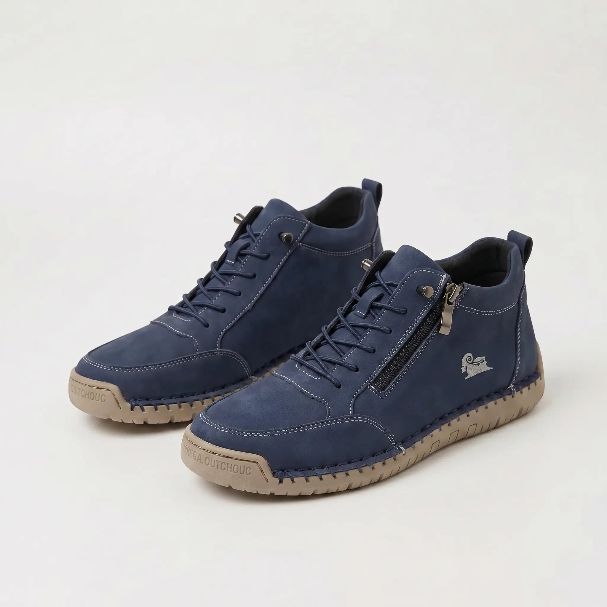 Scarpe ortopediche blu scure con lacci e cerniera laterale, suola beige rigata.