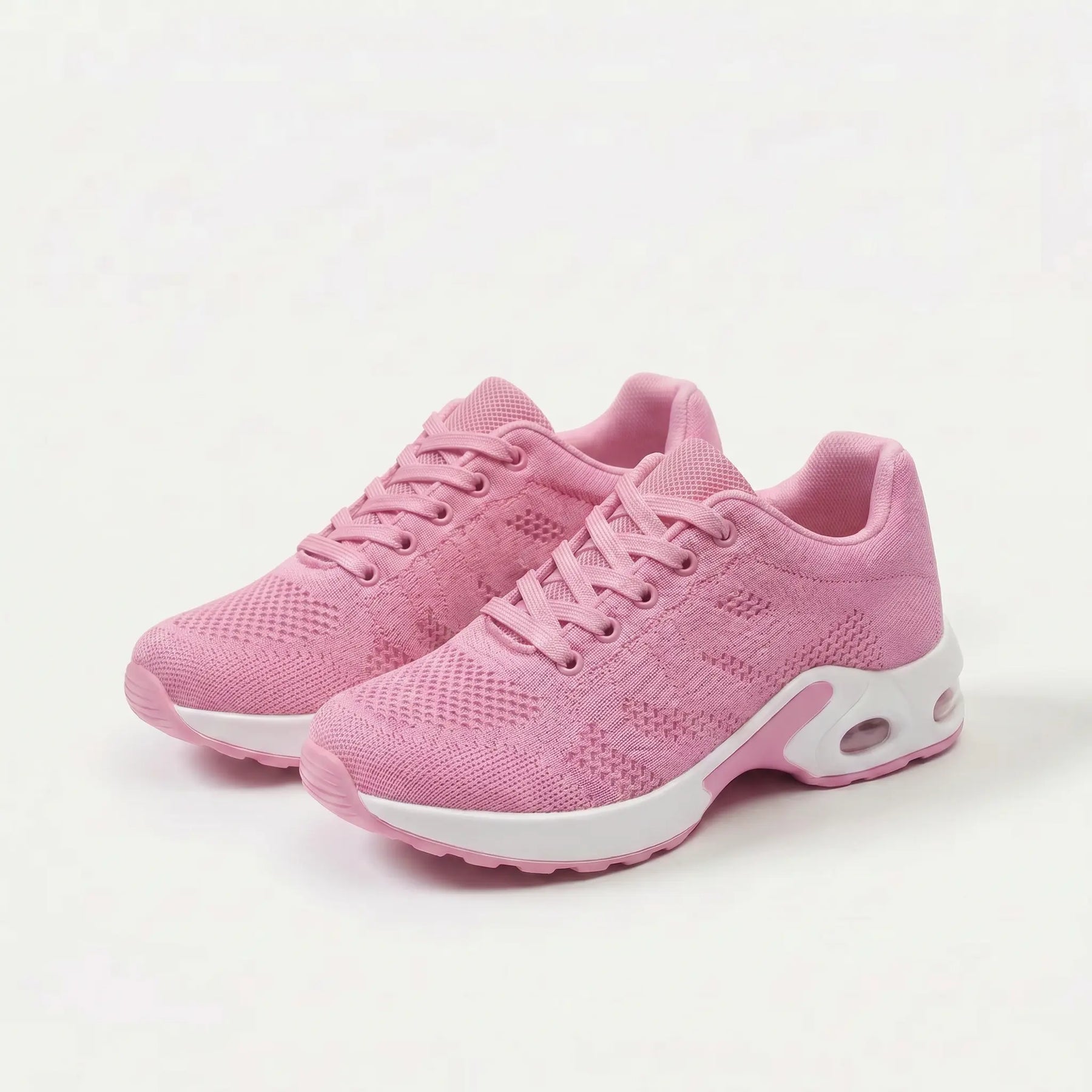 Scarpe ergonomiche con lacci, tomaia tessuto rosa e suola ammortizzata bianca