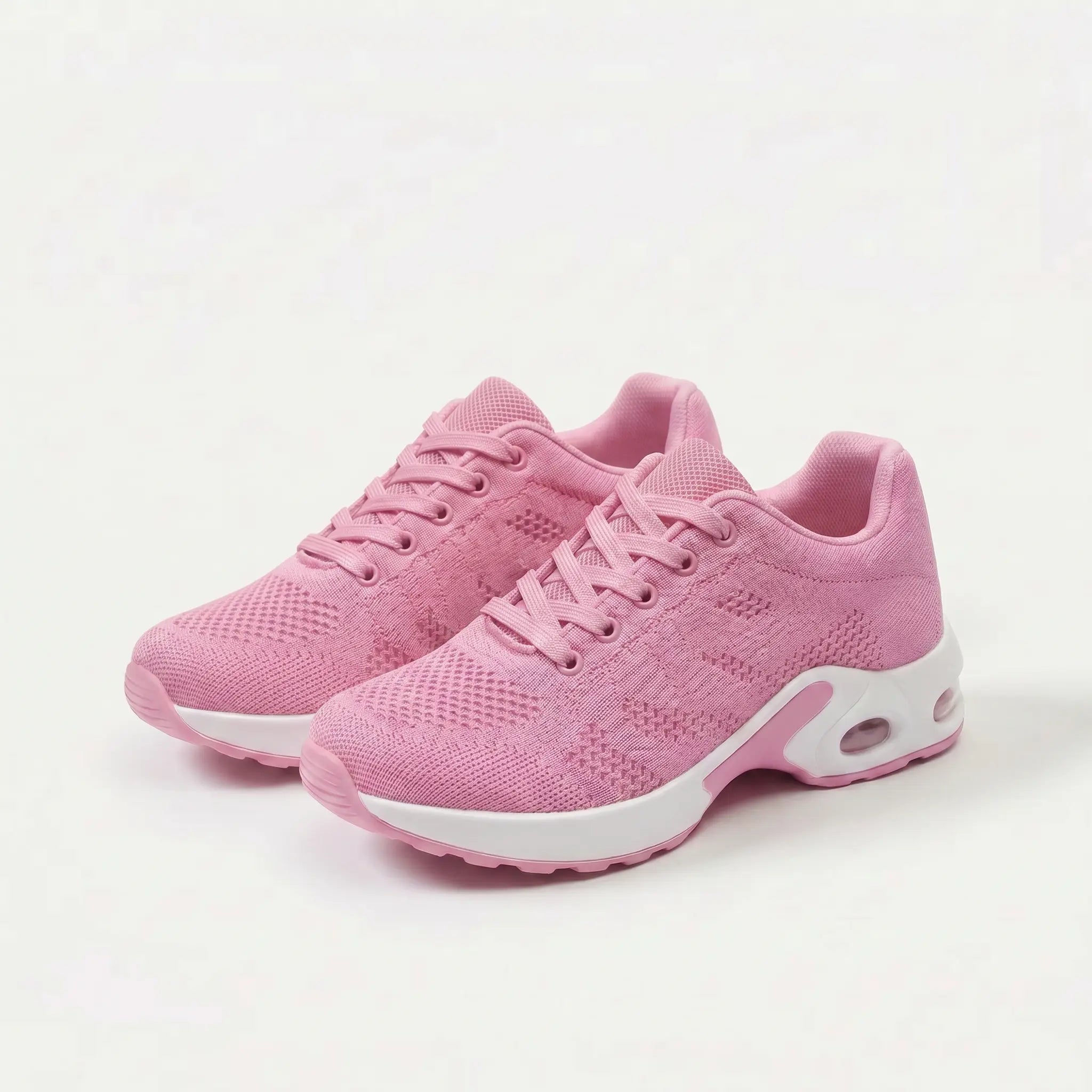 Scarpe ergonomiche rosa chiaro con suola bianca, stringate e inserti ammortizzati