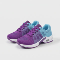 Scarpe ergonomiche con lacci, tomaia viola e azzurro con suola ammortizzata bianca
