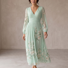 Abito midi verde chiaro con scollo a V, maniche a palloncino e fiori