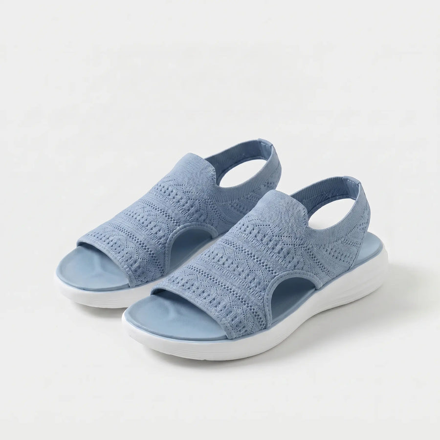 Sandali ortopedici slip-on comodi azzurri in maglia traforata con suola bianca