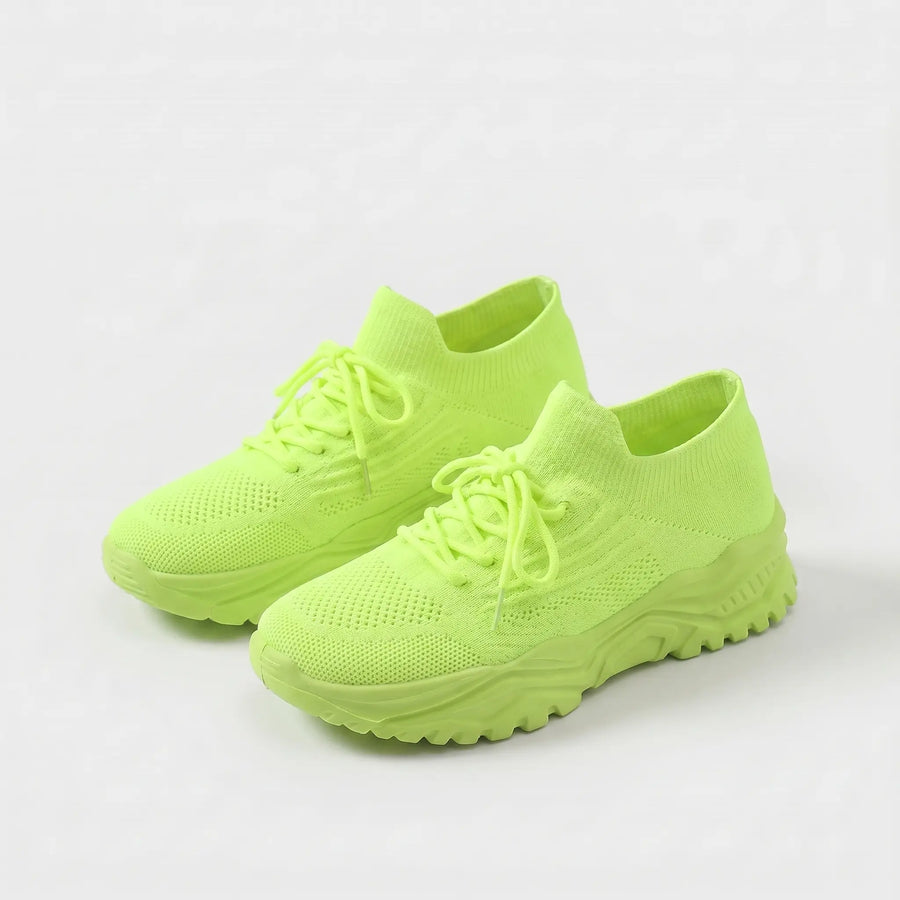 Scarpa ortopedica comoda verde lime in maglia con lacci e suola spessa