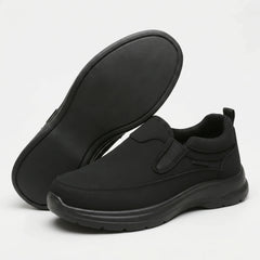 Scarpa ortopedica casual nera con profilo slip-on e suola spessa