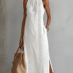 Relaxed embroidered midi dress in white with mandarin collar and sleeveless cut