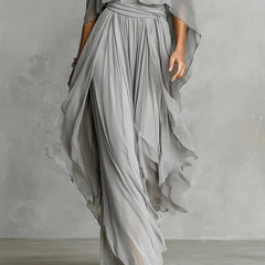 Gray fluid spaghetti-strap top with draped shoulders and lightweight tiered pants