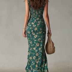 Green boho floral ruched maxi dress from back view with side slit and ruffle straps