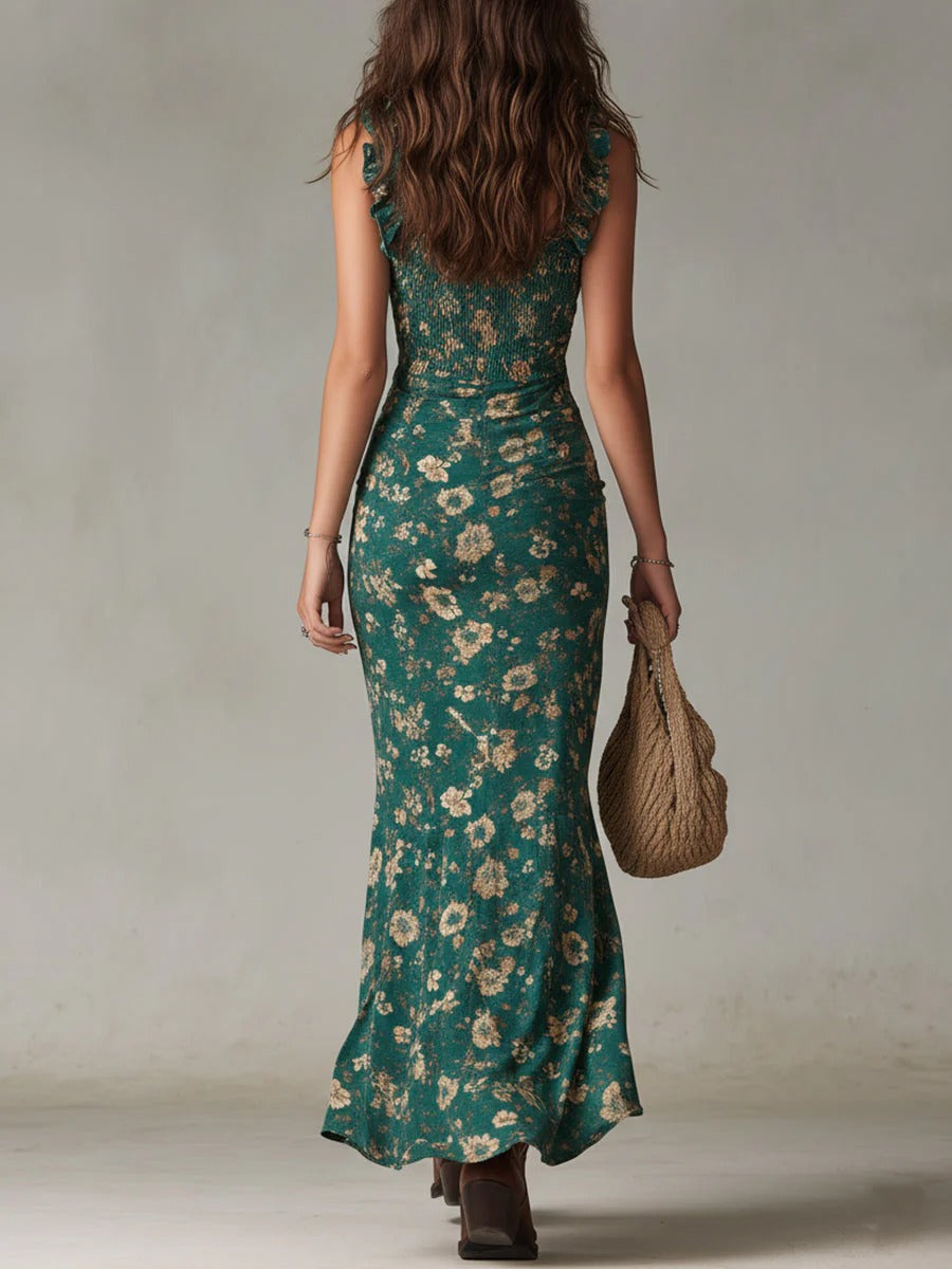 Green boho floral ruched maxi dress from back view with side slit and ruffle straps