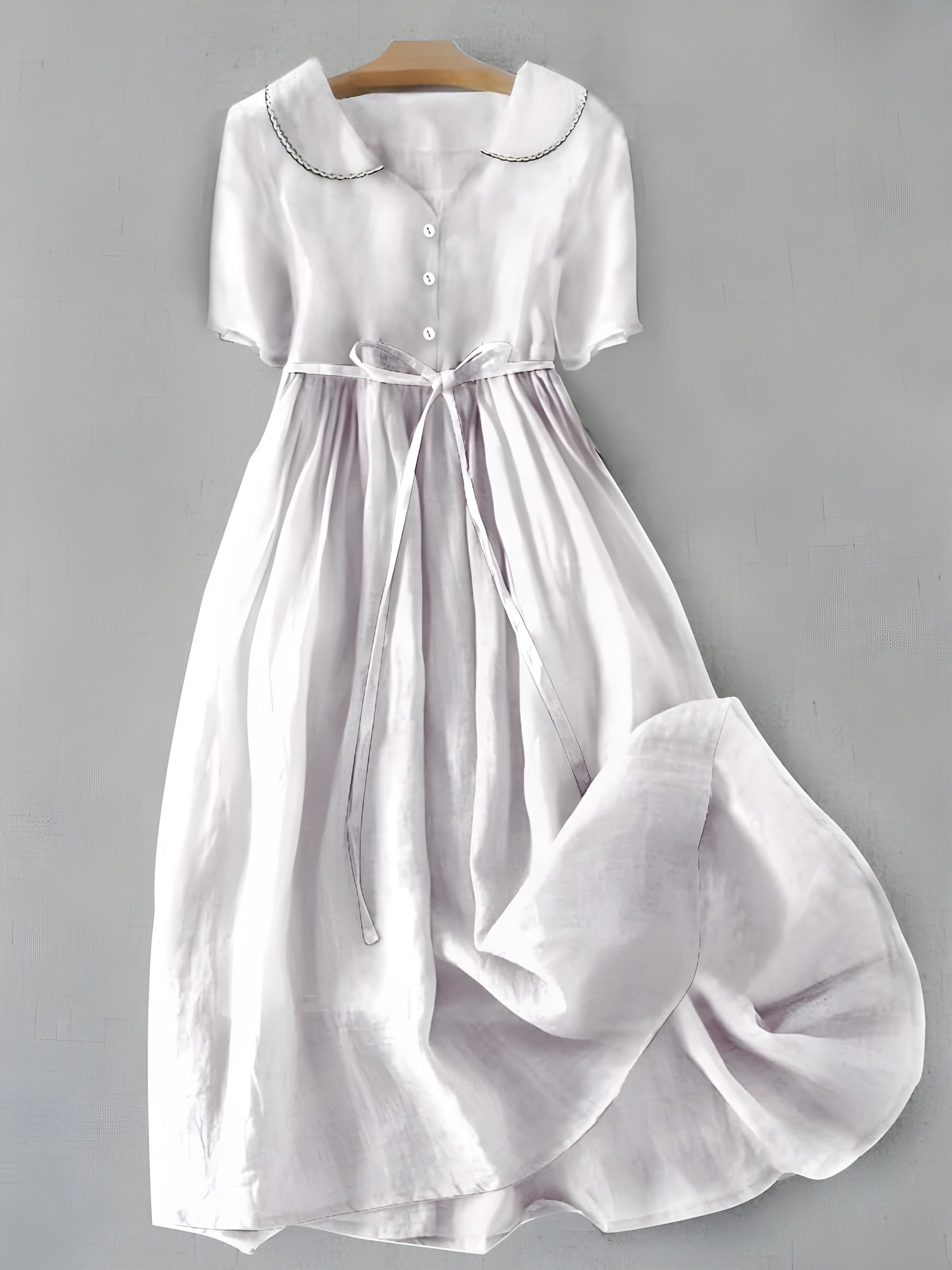 Light purple classic dress with button-front bodice, gathered skirt, drawstring waist tie