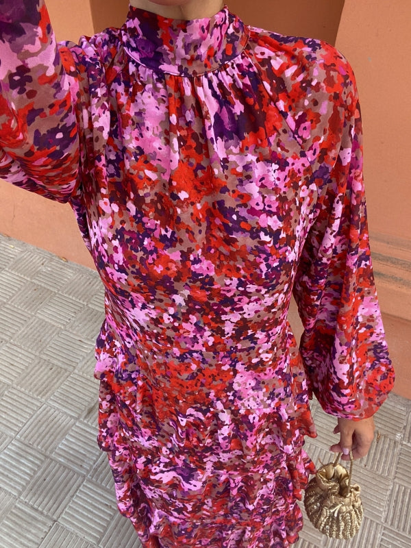 Floral midi dress close-up: ruffled high neckline, gathered waist, long sleeves
