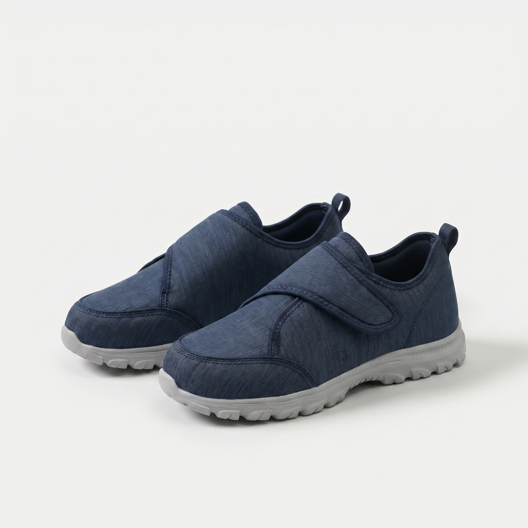 Scarpe ortopediche in tessuto blu con cinturino a strappo e suola spessa